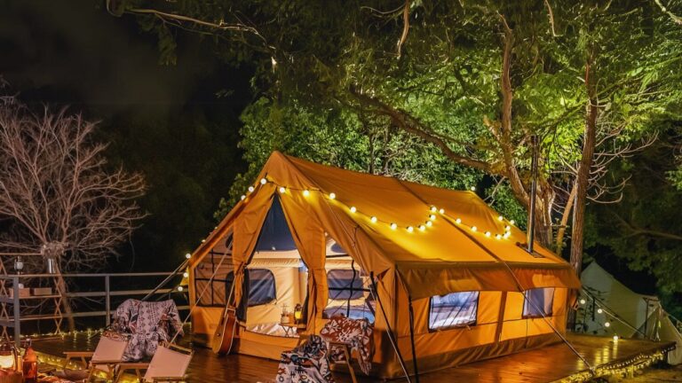 Yellow Colour Inflatable Tent House Setup In The Lawn For House Party